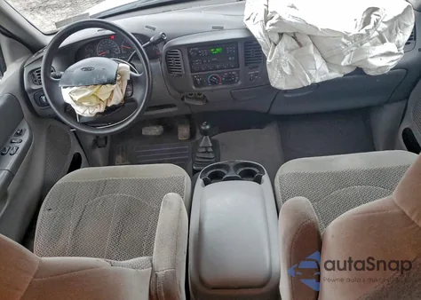 1999 Ford F150 z USA, uszkodzony, nr VIN 1FTRX18WXXNA39032